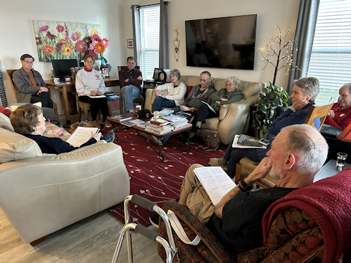 Book club discussion in a living room